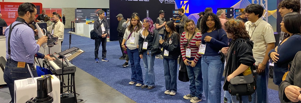 Douglas Hachiya playing the TAHORNG Elesa which is a MIDI wind controller and electronic saxophone, to a group of students at Winter NAMM 2026